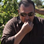 mauel-tasting-grape Manuel tasting old vine grape.