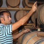 raul-wine-barrel Raul, Vintae Winemaker, pouring wine from French Oak Barrels